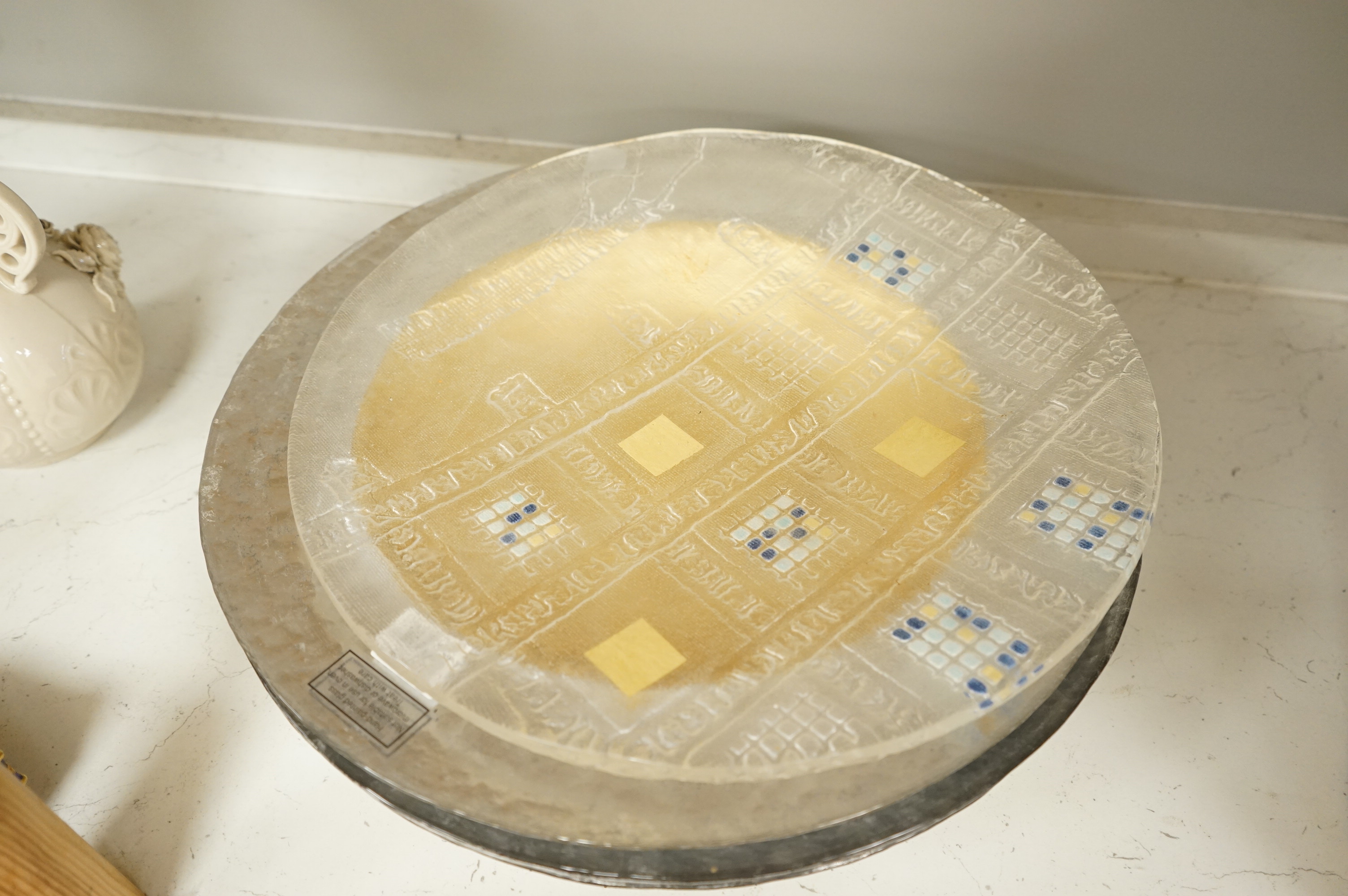 Deborah Timperley, a Studio art glass dish, 34cm, together with ten Carnelian studio glass dishes, largest 37cm